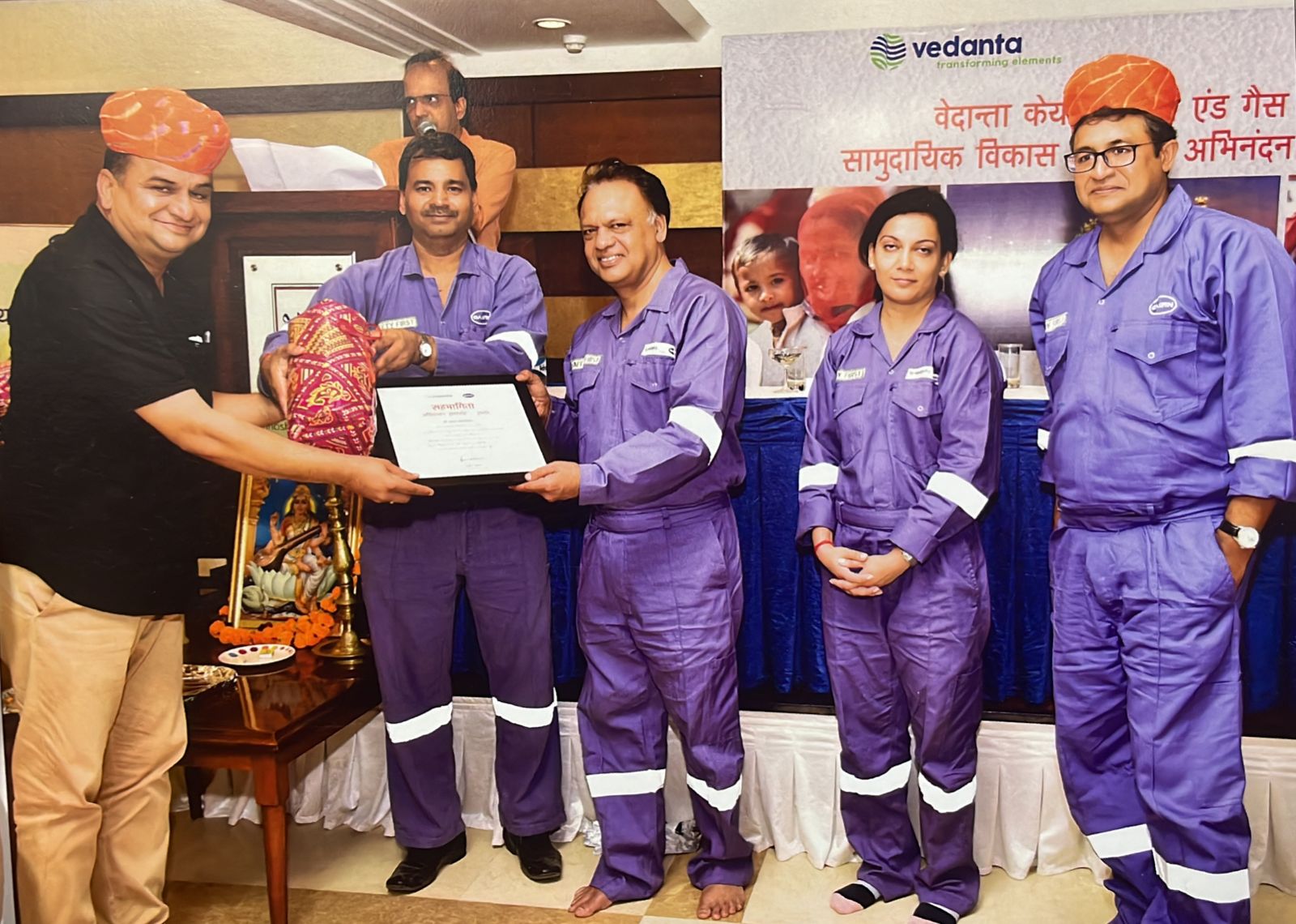 Receiving appreciation award from  Mr. Mathur CEO, Cairn Oil and Gas, Ltd